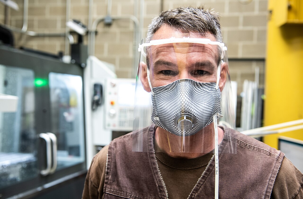 Research Tech cuts parts for face shields, as part of the Flatirons Face Shield Project, maintaining social distancing, as per Covid-19 Return-to-Camp